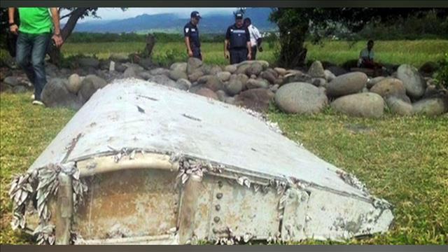 Reunion Island Wing Part Confirmed to Be from MH370 Plane Type, Suitcase Found